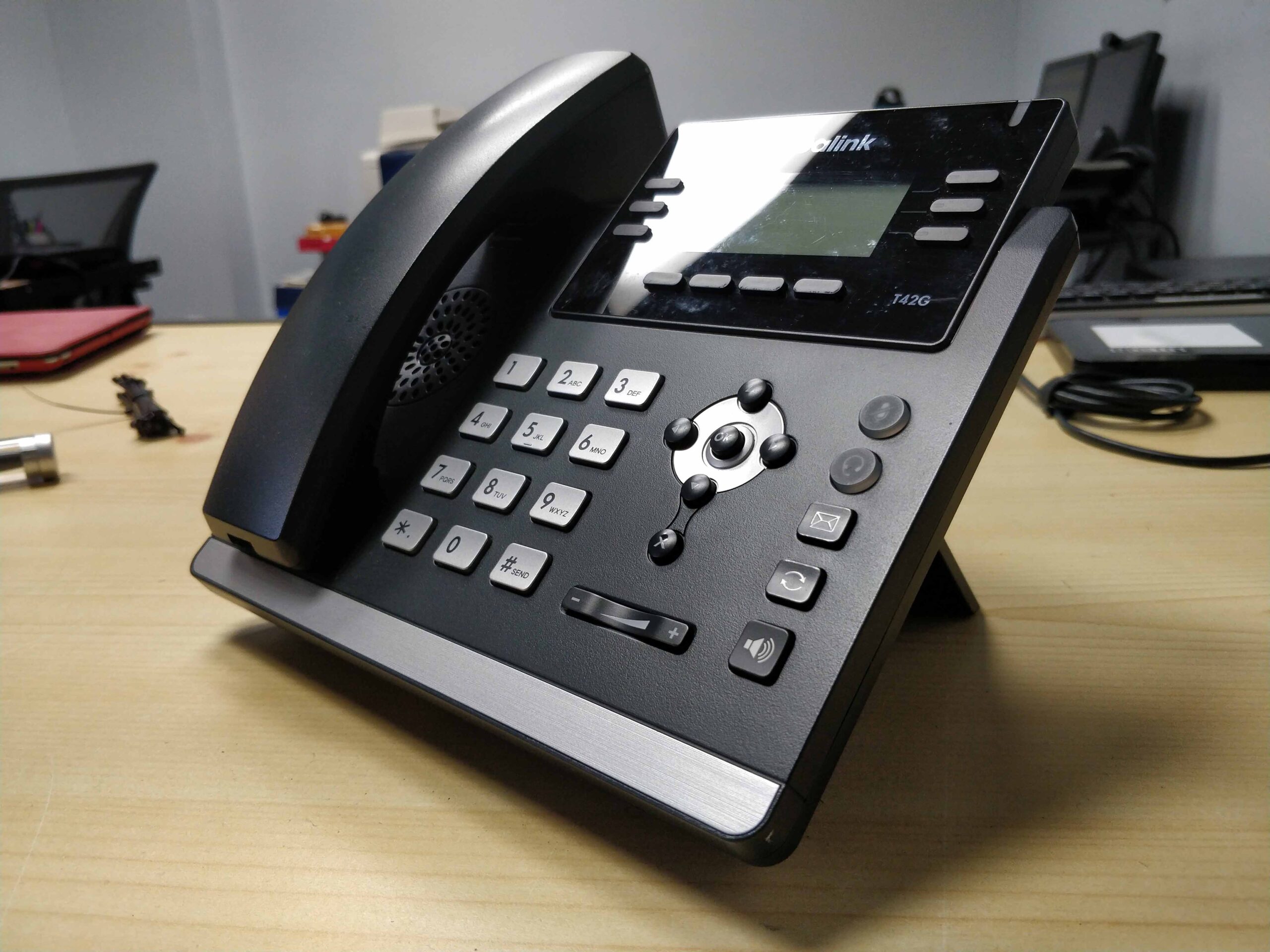 Desktop phone on desk.